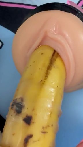 My stepsister  puts a condom on the banana, plays with it, then sticks it in a fake pussy   Clip 1