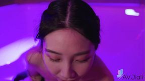 Chinese raven-haired Li Er gets a hot blowjob and tug job in the bathroom