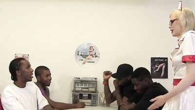 Blonde hottie with sexy glasses railed by multiple black studs