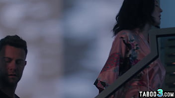 Busty brunette Charlotte Sins gives a deepthroat blowjob on two big dicks