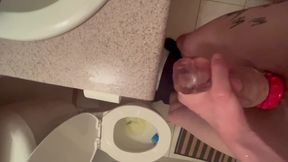 Stroking in bathroom and cumshot