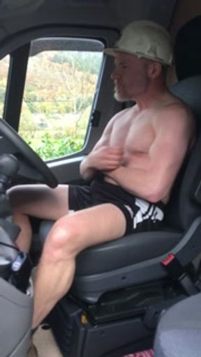 Naked muscular trucker gets turned on flexing his muscles in his truck cab, big cum shot.