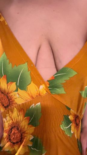 sunflower dress gets pulled down releasing saggy breasts