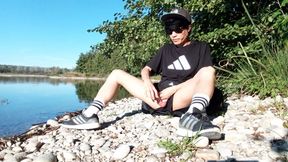 Where will he cum? After working out outside near a lake, this gay Asian twink takes his cock out of his very short shorts and j