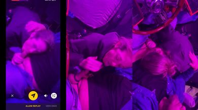 Part 1 of Wife giving trucker head int he truck under purple glow.