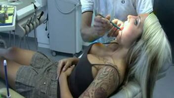 Carolin Wosnitza gives lusty blowjob during dental checkup