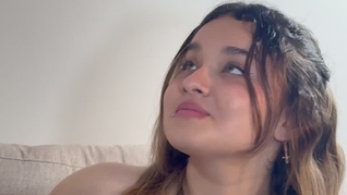 woman with a beautiful face and green eyes enjoys an afternoon of rest with her beautiful body