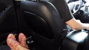 Horny mature woman masturbates in the backseat of a taxi and teases the driver in public