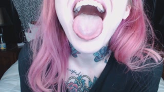 pink haired girl holds mouth wide open for you ;)