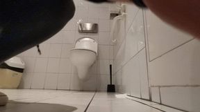 Strong and loud relase in work toilet next to coworkers