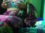 Indian Gay Crossdresser in pink saree pressing and milking his boobs so hard and enjoying the hardco