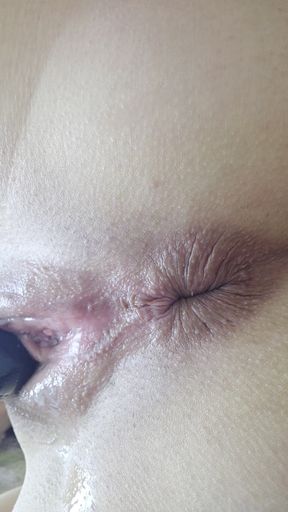 Fetish girl Ana Liz puts a butt plug in her pussy and then in her ass
