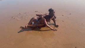 Submission wrestling on A beach