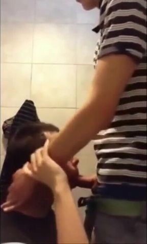 Twink Gets Face Fucked and Swallows Cum in University Bathroom