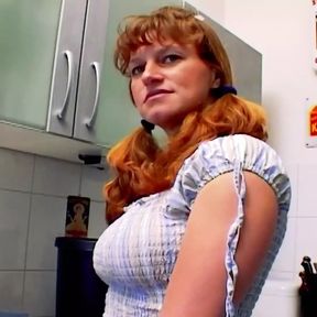 A curvy German babe gets her asshole smashed in the kitchen