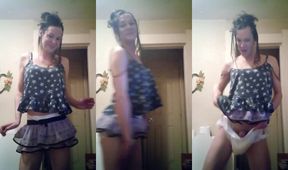 Bathroom play in purple skirt while getting wet through diaper