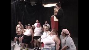 Two dozens of lard-asses suck, lick and fuck each other during The Worlds First 300 Lb Gang Bang, organized by ingenious beauty Kat Kleevage