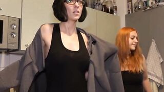 Red Head giving oral sex into front of nylon woman with glasses