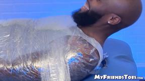 ”Shaved head Dallas was saran wrapped in a tickle torment by the master”