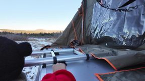 Mountain girl shows off rooftop tent set up and light up butt plug