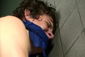 Bound boy beplayed by rough soldier