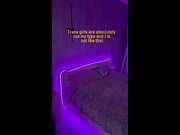 Purple glow outlines her hips as she stretches across the sheets 😇