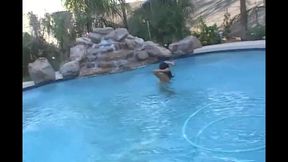 Hot Young Shemale Gets a Naked Swim in the Pool