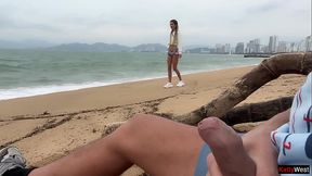 Skinny brunette flashes tits and gives handjob