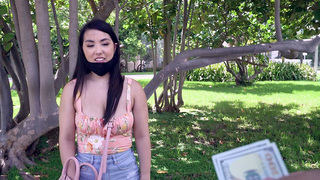 Asian Mina Moon is getting picked up outdoors