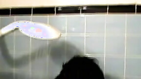 ”Amateur inked twink with a tan showers in classics porn”