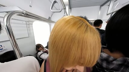 Busty girls in front of you on a crowded train