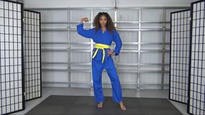 HONEY EARNS HER ORANGE KARATE BELT