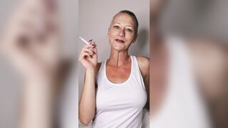 Kiki Smoking After Buzz Cut