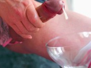 Femboy in open pink panties caresses his straight big cock and cums in a glass. Closeup video