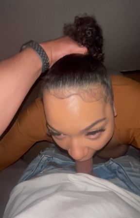 MILF gives deep throat blowjob to black man