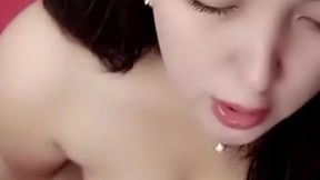 Asian teen Cece Momoshan jilating her pussy