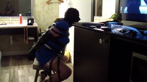 female slave bound in leather, wearing bdsm harness and stay motionless
