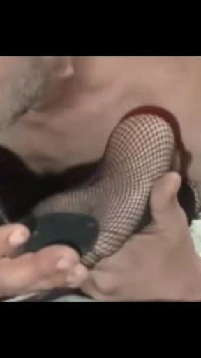 Worshiping Her Feet with Net Stockings