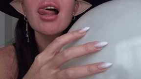 The shrill sound of a witch scratching a balloon bb