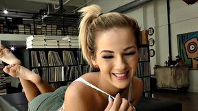 Oiled-up blonde with perky tits gives dirty talk while stroking a big dick