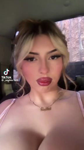 Curvy blonde in a public setting shows off her extra large African mole snake