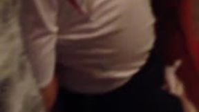 Miss M and a helpless hogtied man in football kit on the sofa