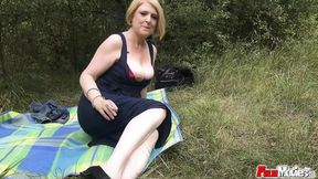 Older woman enjoys outdoor intimacy