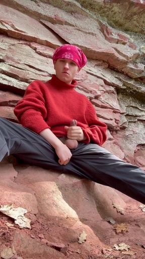 College boy plays with his hard cock on a hiking trail