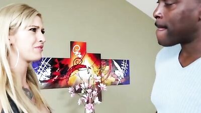 Inked blonde hussy is playing with one of the biggest black cocks