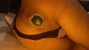Naughty shemale opens her ass with a huge cucumber and I love it.