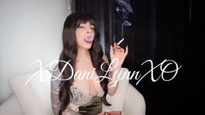 Smoking in Green Velvet Dress