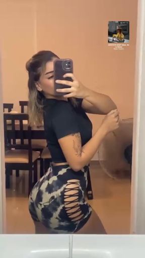Teeny bopper with big jugs shows off her round rump and ample bosom