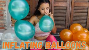 Inflating colorful balloons