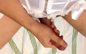 Lonely crossdresser in white corset